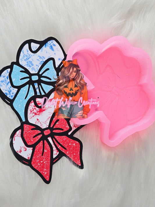 Cowboy hat with bow.